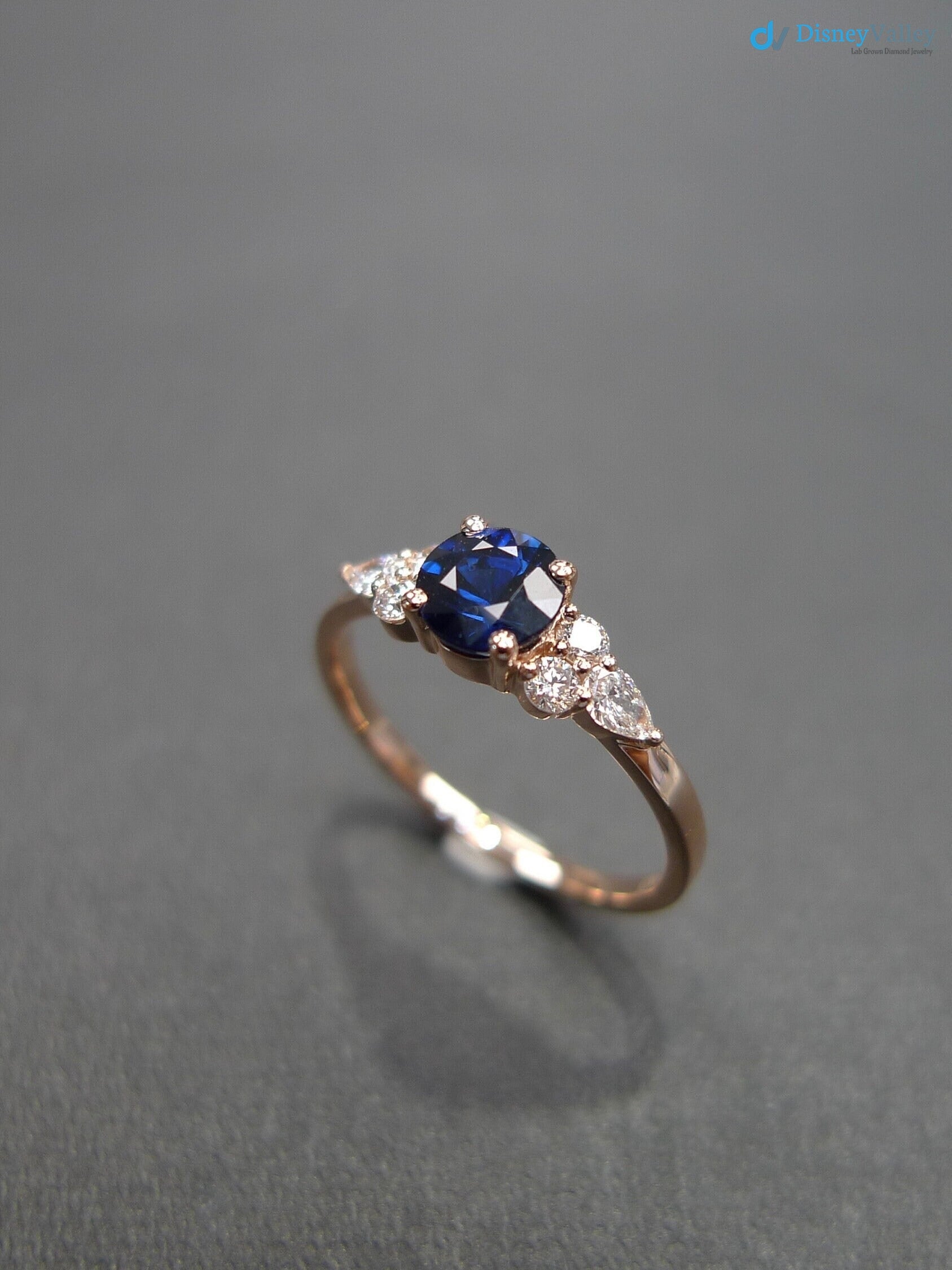 Unique Blue Sapphire and Pear Diamond Engagement Ring - DisneyValley 