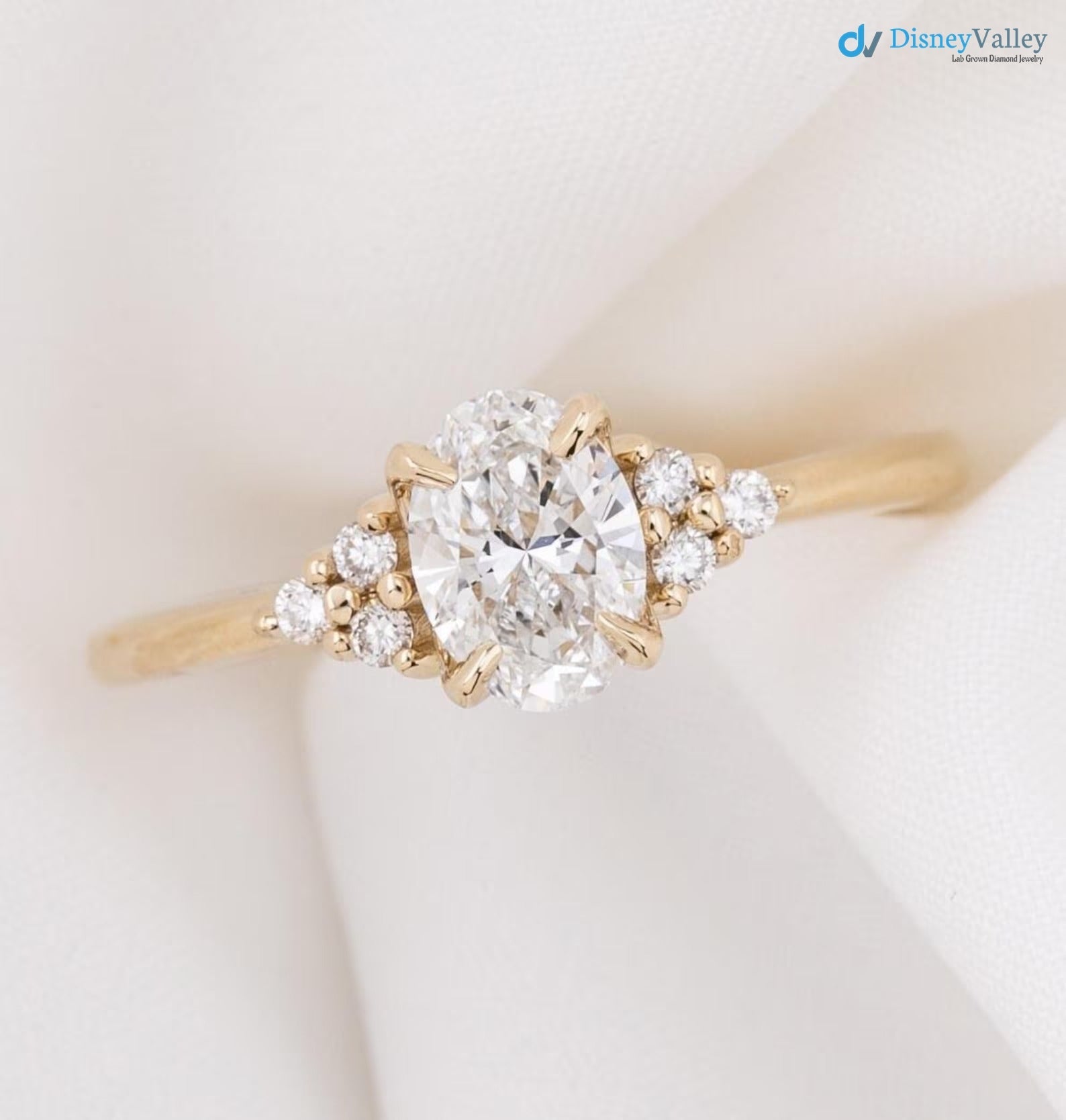 lab diamond engagement ring, oval brilliant cut diamond, diamond cluster engagement ring