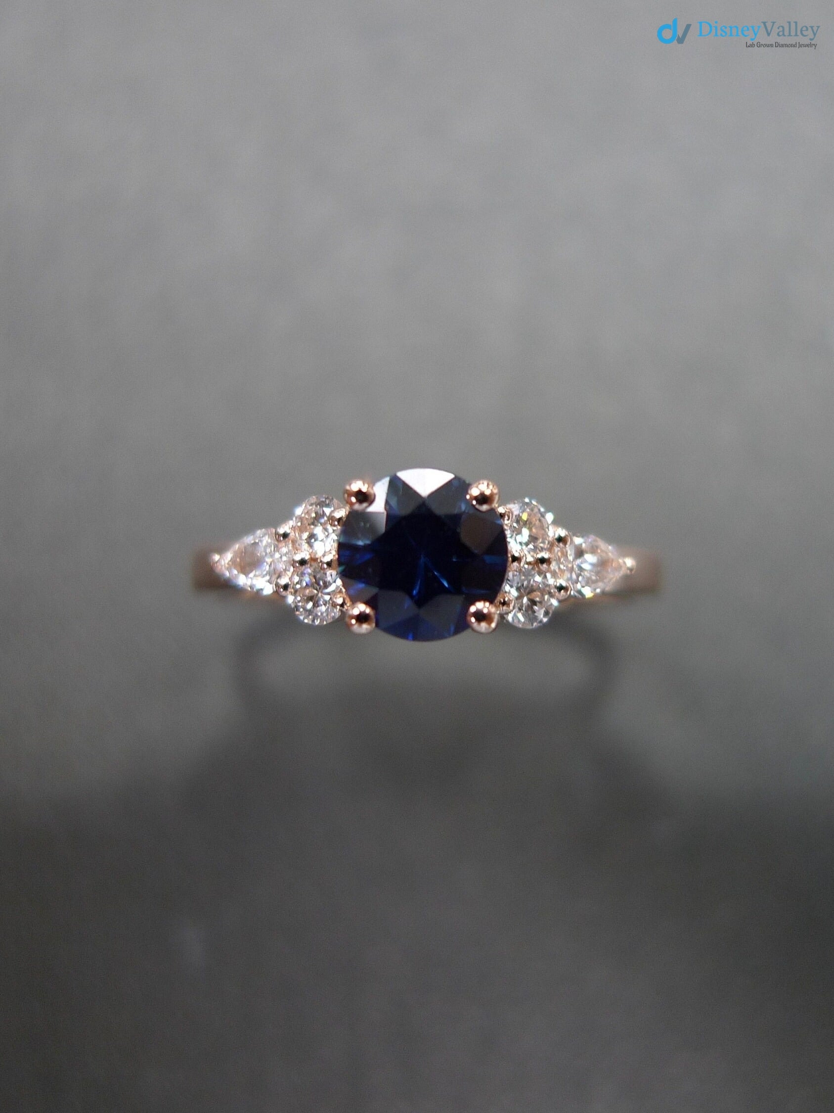 Unique Blue Sapphire and Pear Diamond Engagement Ring - DisneyValley  Main image