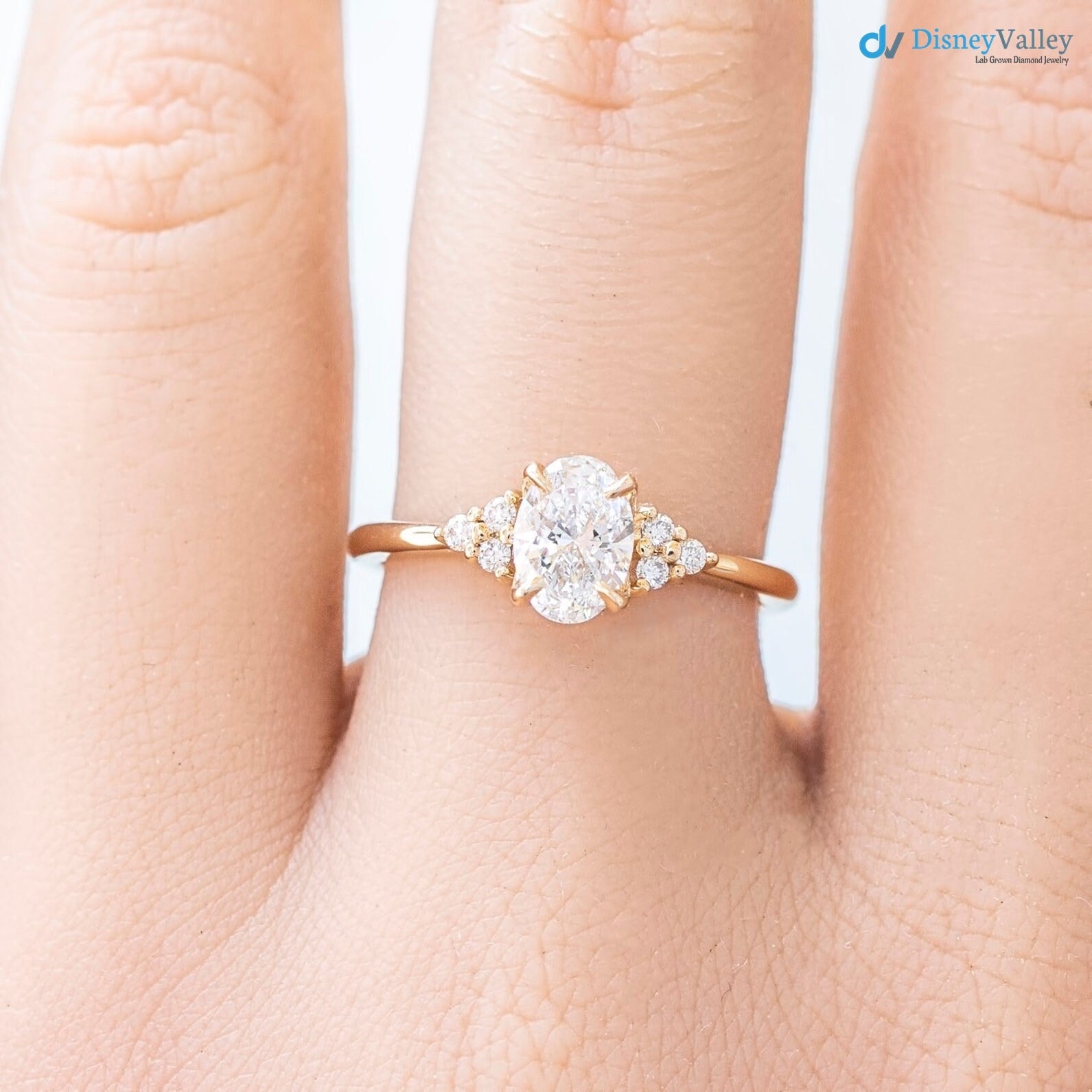 lab diamond engagement ring, oval brilliant cut diamond, diamond cluster engagement ring