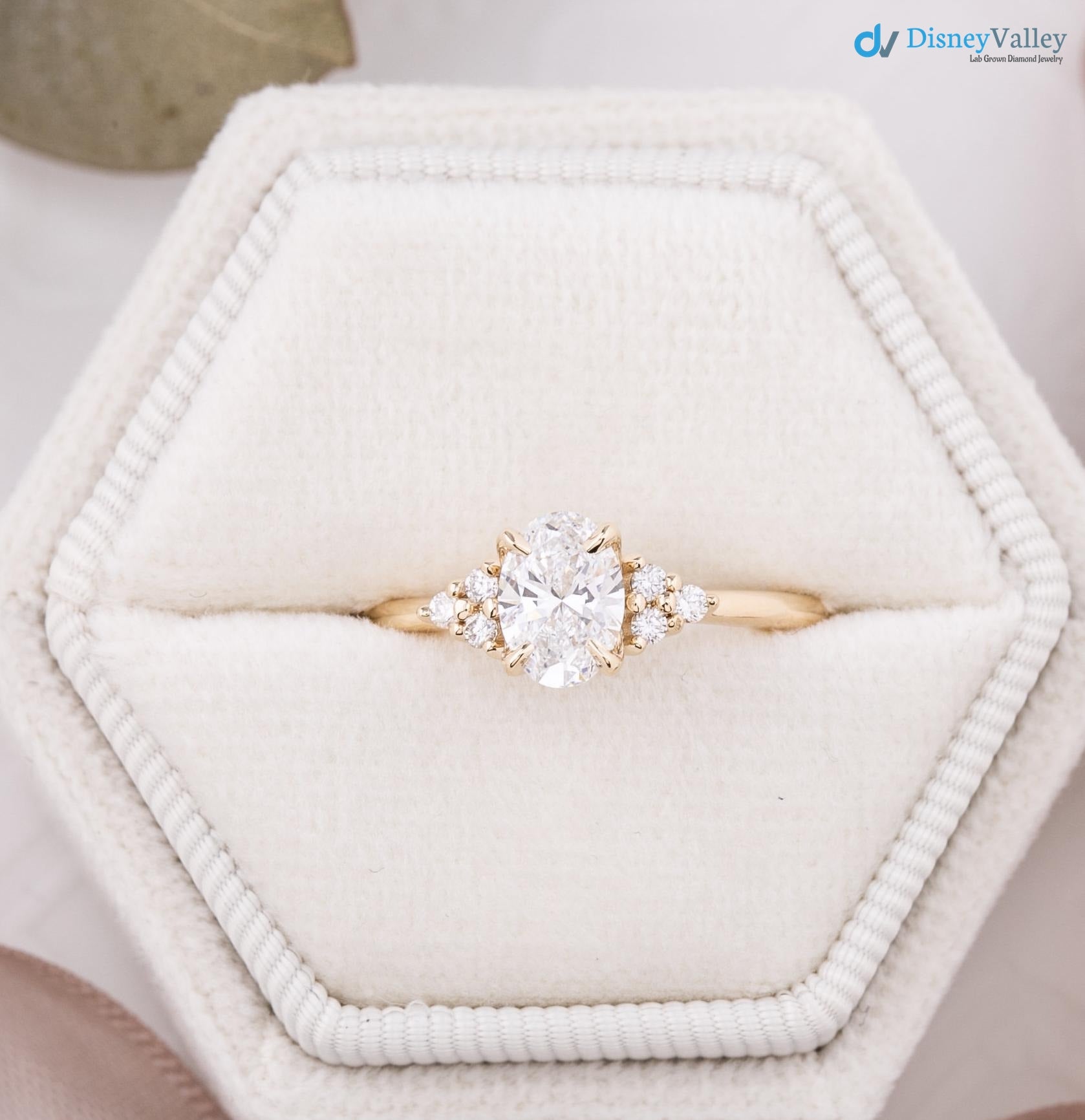 lab diamond engagement ring, oval brilliant cut diamond, diamond cluster engagement ring