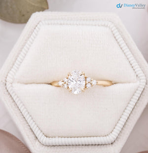 lab diamond engagement ring, oval brilliant cut diamond, diamond cluster engagement ring