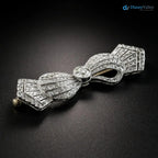 Late Edwardian/Art Deco shining European-cut Diamond Bow Brooch