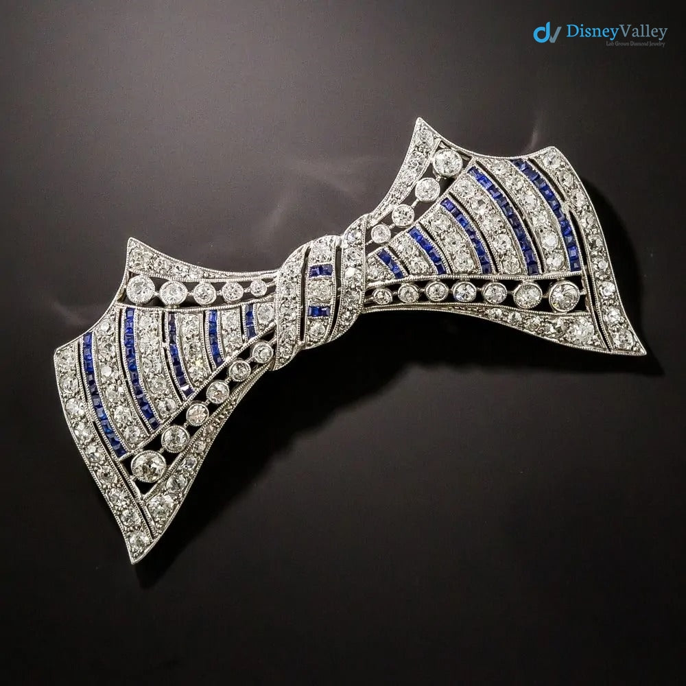 Art Deco Diamond and Calibre Sapphire 925 sterling silver Bow Pin