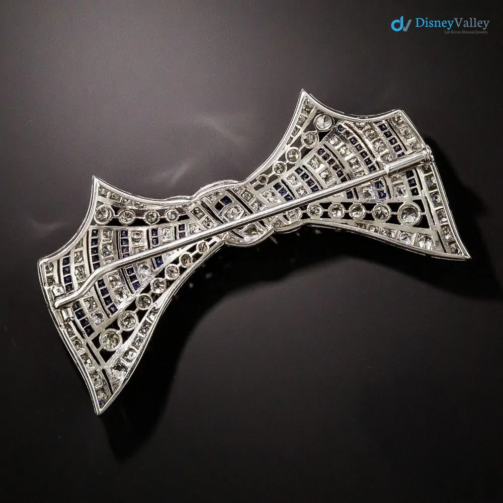 Art Deco Diamond and Calibre Sapphire 925 sterling silver Bow Pin