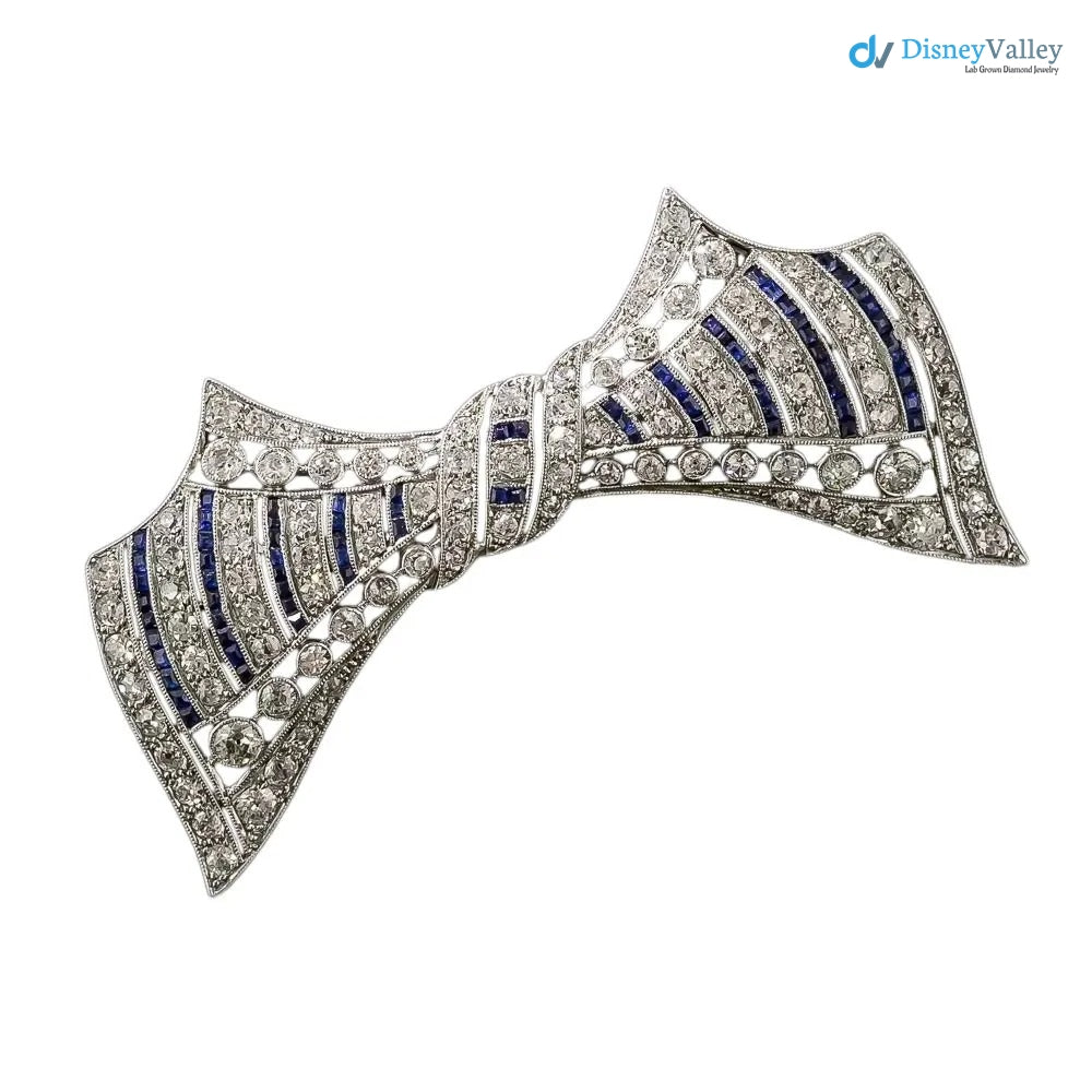 Art Deco Diamond and Calibre Sapphire 925 sterling silver Bow Pin