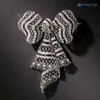 Edwardian Diamond and black enamel Bow Knot Brooch