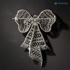 Edwardian Diamond and black enamel Bow Knot Brooch