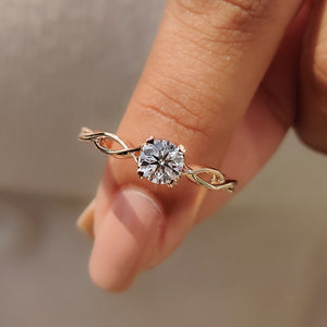 Round Solitaire Engagement Ring With Twisted Shank Band