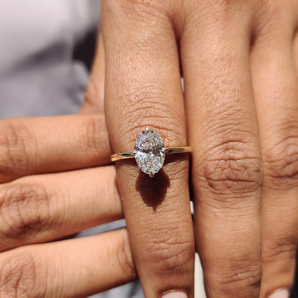 Oval Solitaire Diamond Ring With Compass Prong