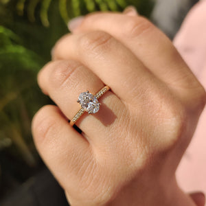 Oval Cut Diamond Ring In Pave Style