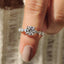 Round Brilliant Cut Diamond Ring With Round Cut Side Stones