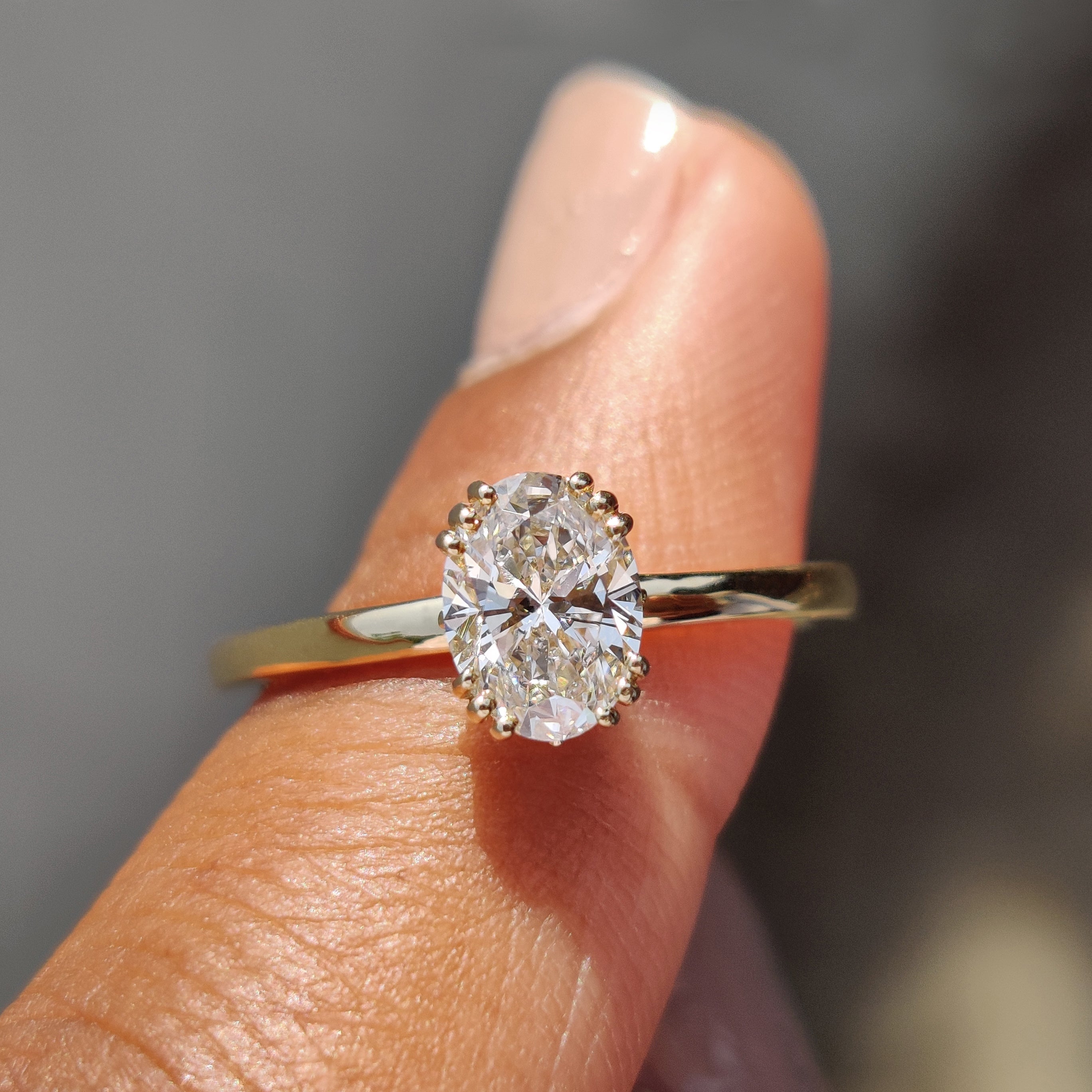 Oval Shaped Diamond Ring In Solitaire Setting