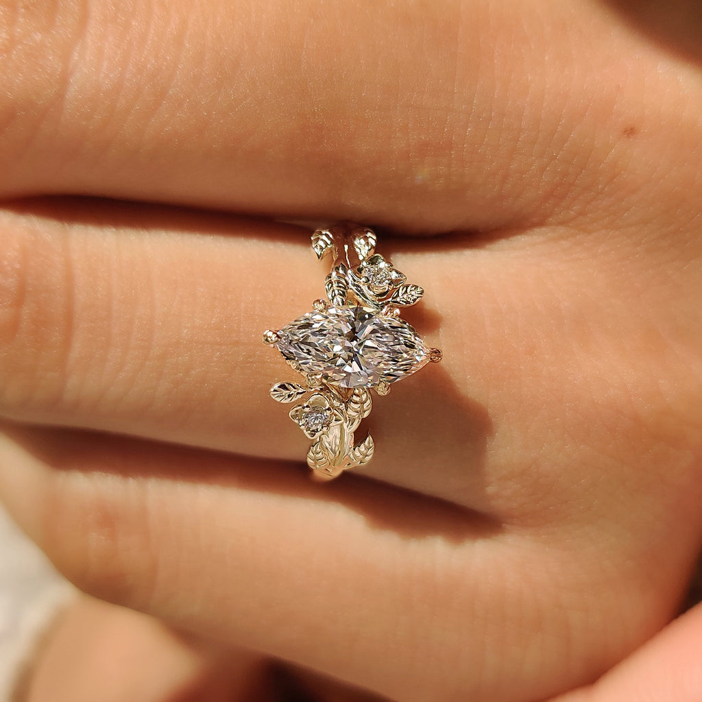 Nature Inspired Marquise Cut Engagement Ring with Round Side Stone
