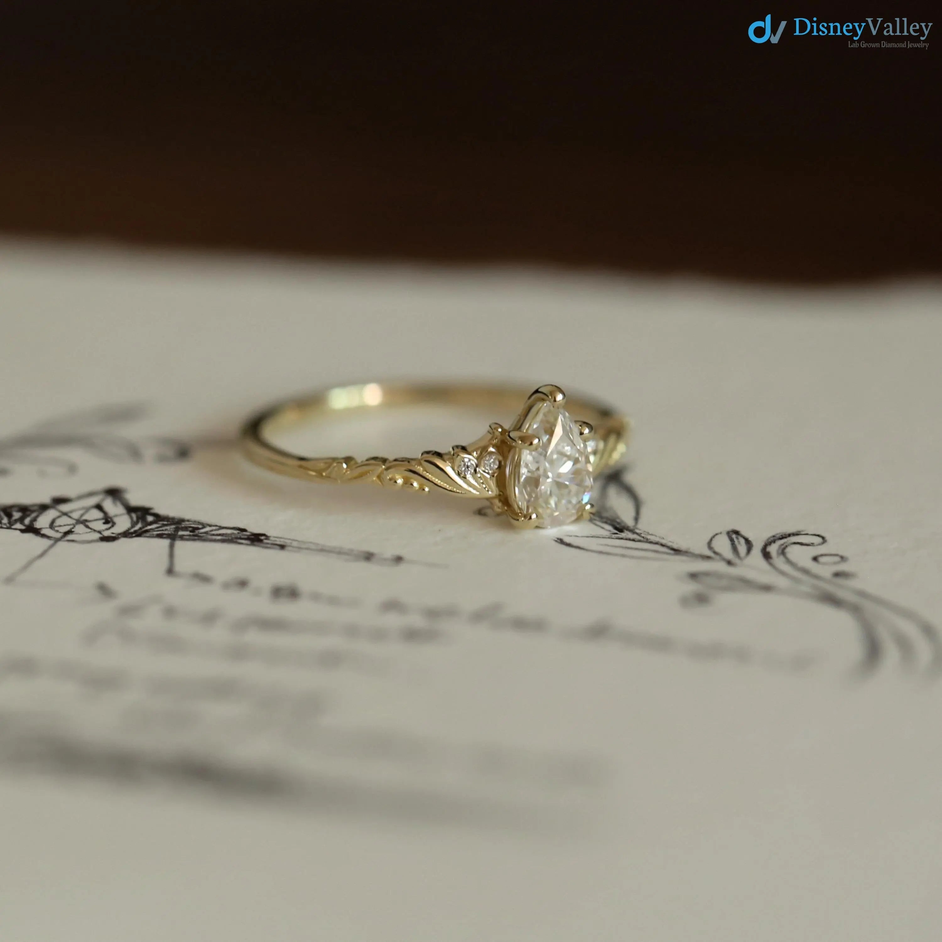 Foliate engagement ring, wedding solitaire pear cut diamond vintage leaf ring DisneyValley