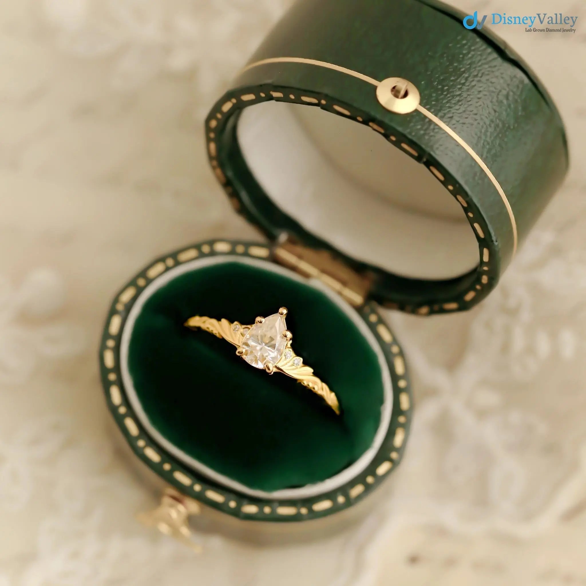 Foliate engagement ring, wedding solitaire pear cut diamond vintage leaf ring DisneyValley
