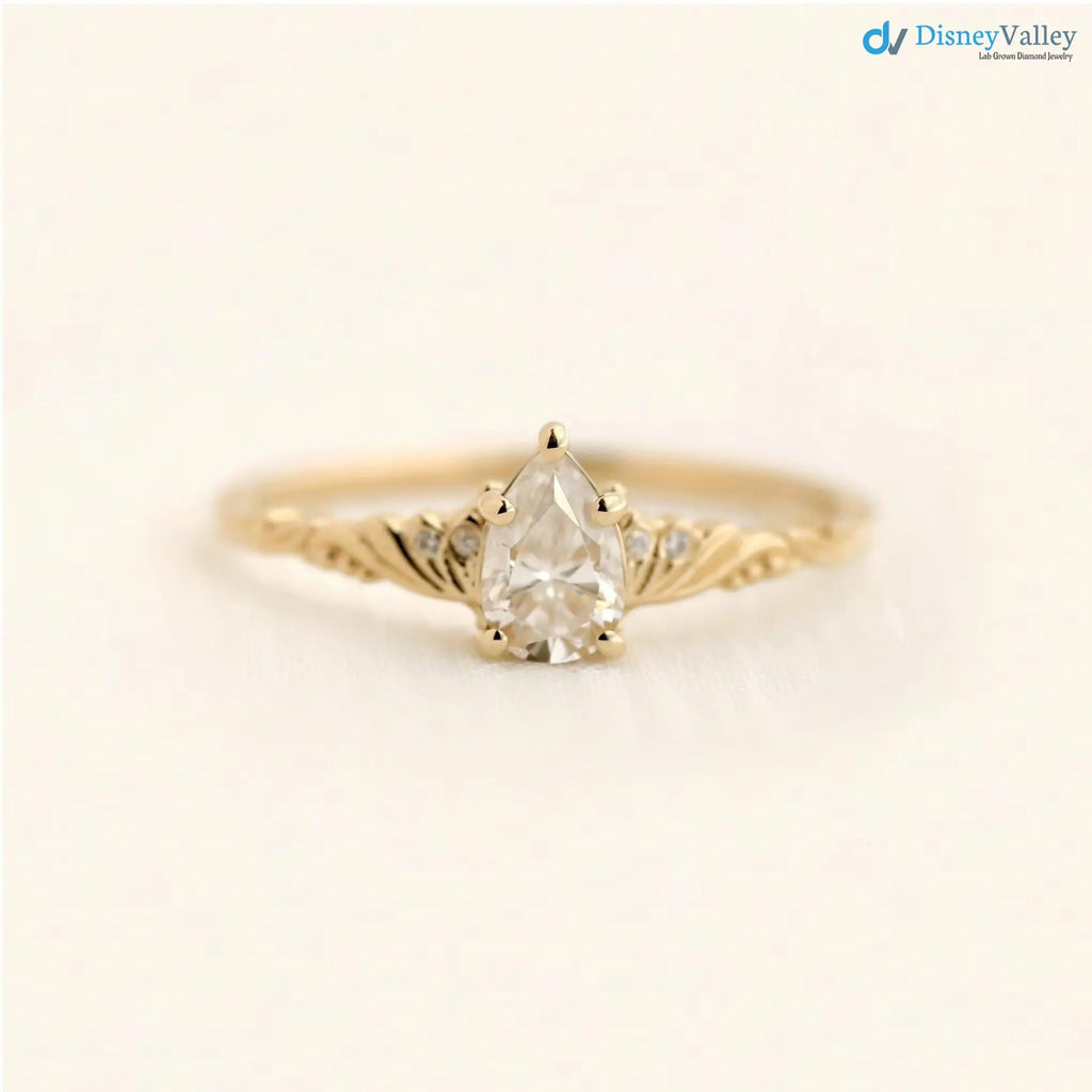 Foliate engagement ring, wedding solitaire pear cut diamond vintage leaf ring DisneyValley