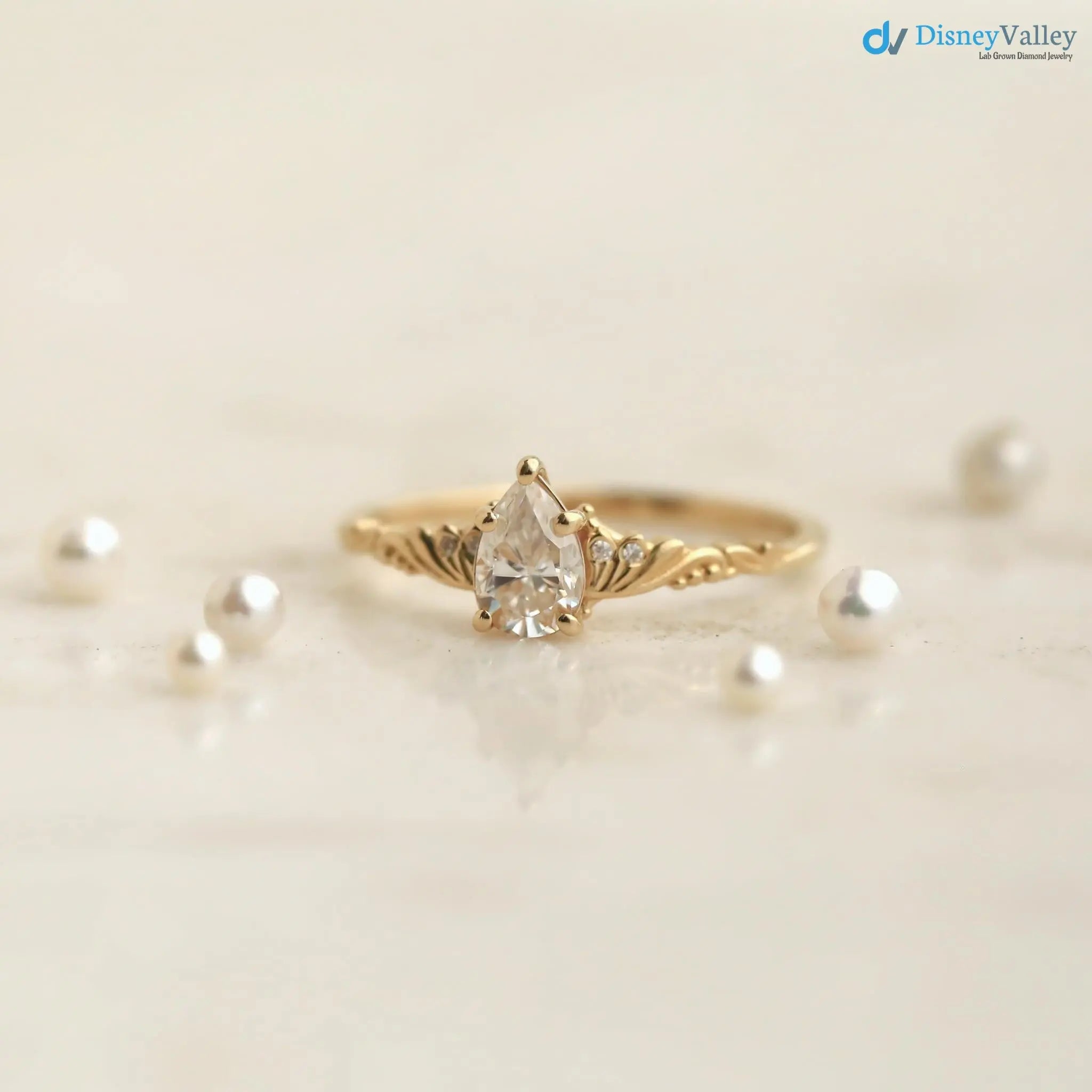 Foliate engagement ring, wedding solitaire pear cut diamond vintage leaf ring DisneyValley