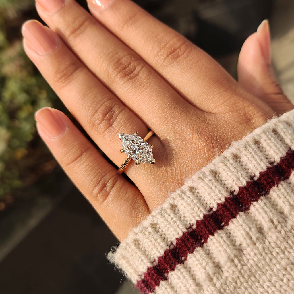 Solitaire Style Dutch Marquise Engagement Ring in Cathedral Setting