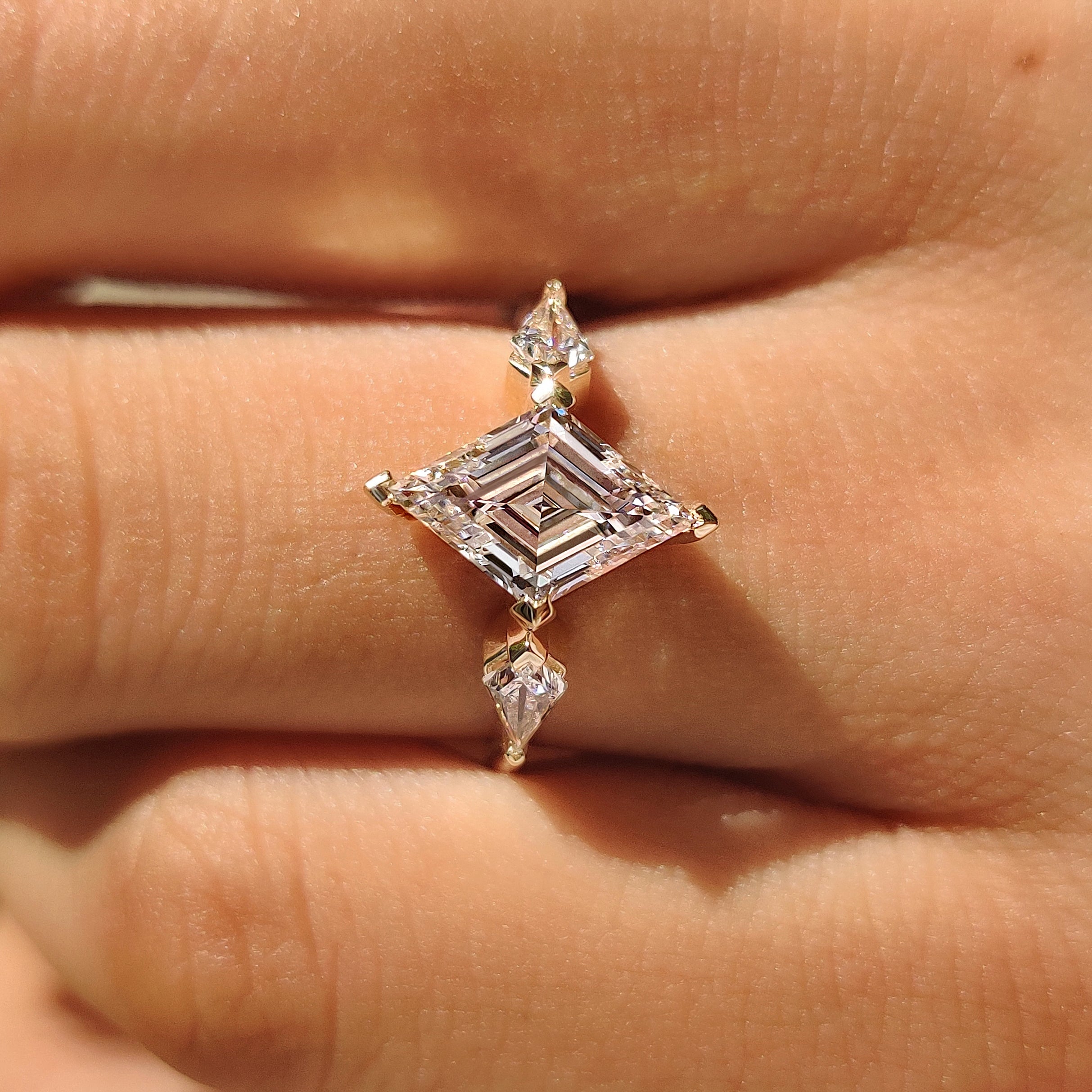 Lozenge Cut Engagement Ring with Kite Cut Side Stone