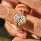 Oval Cut Diamond Ring in Round Cut Diamond Basket Setting