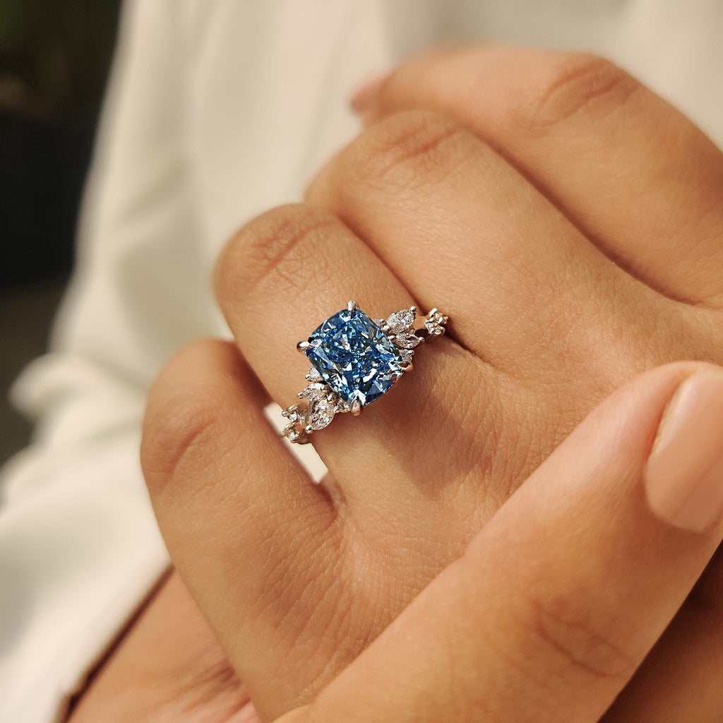 Blue Cushion Cut Diamond Ring in Cluster Setting
