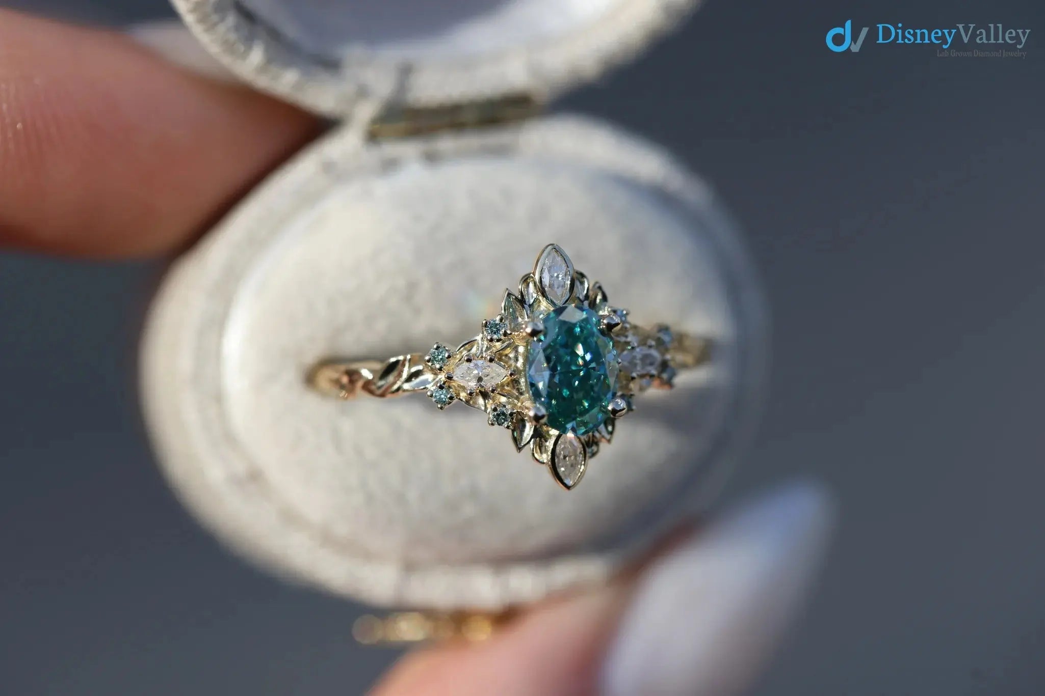 Galadriel with 7x5mm oval teal marquise cut lab grown engagement ring DisneyValley