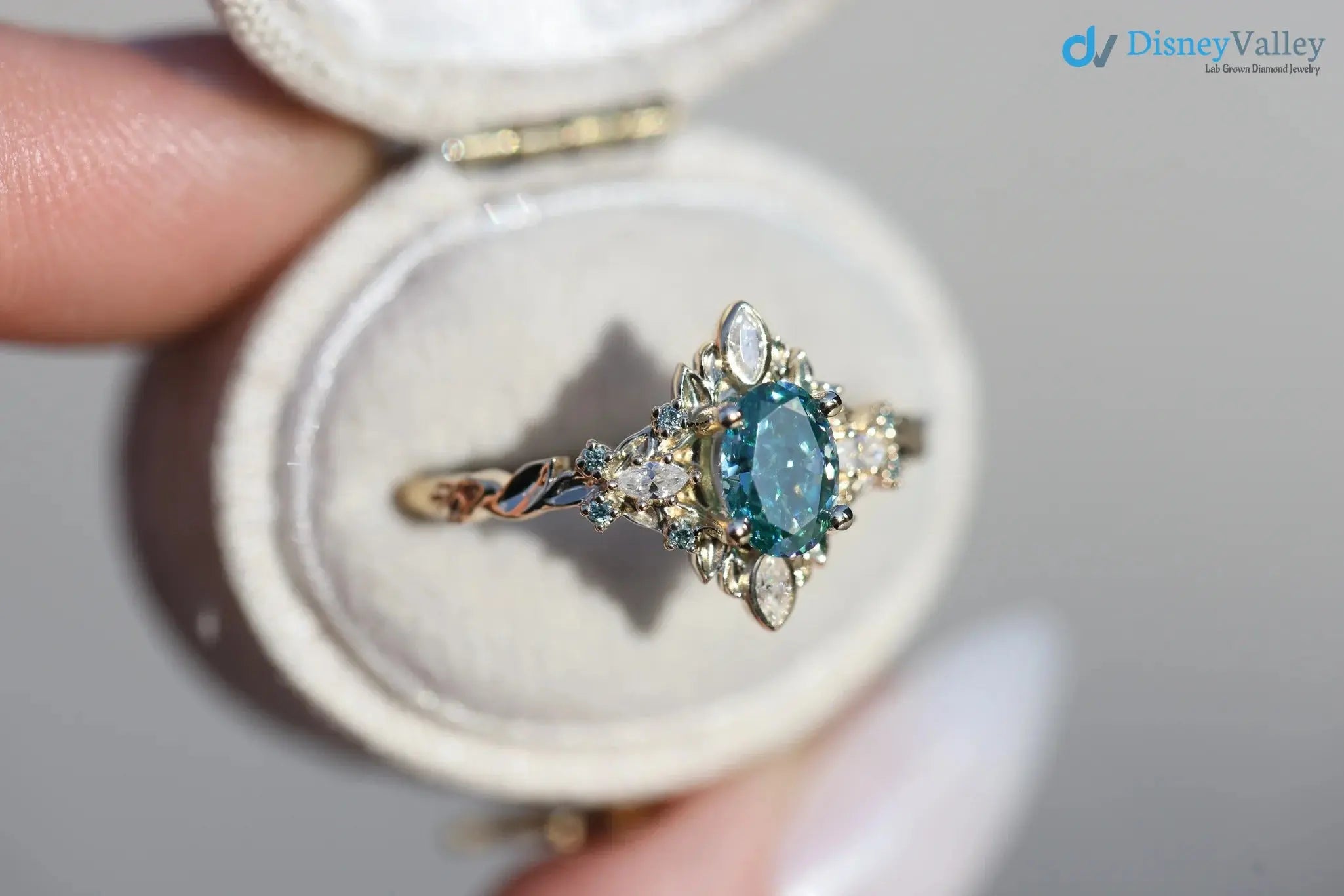 Galadriel with 7x5mm oval teal marquise cut lab grown engagement ring DisneyValley