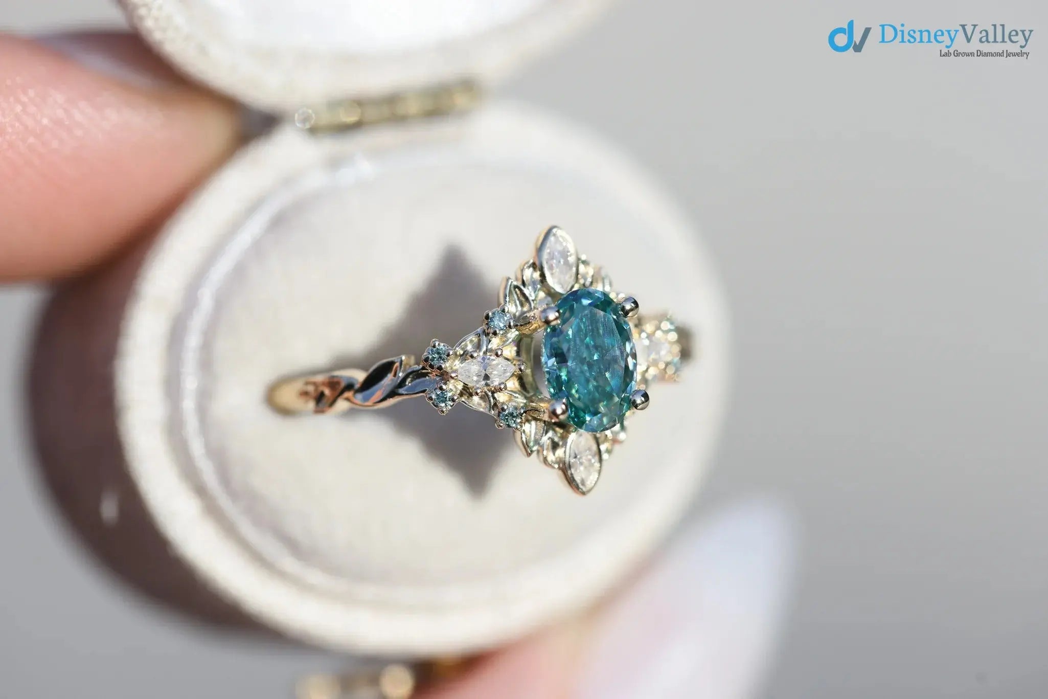 Galadriel with 7x5mm oval teal marquise cut lab grown engagement ring DisneyValley