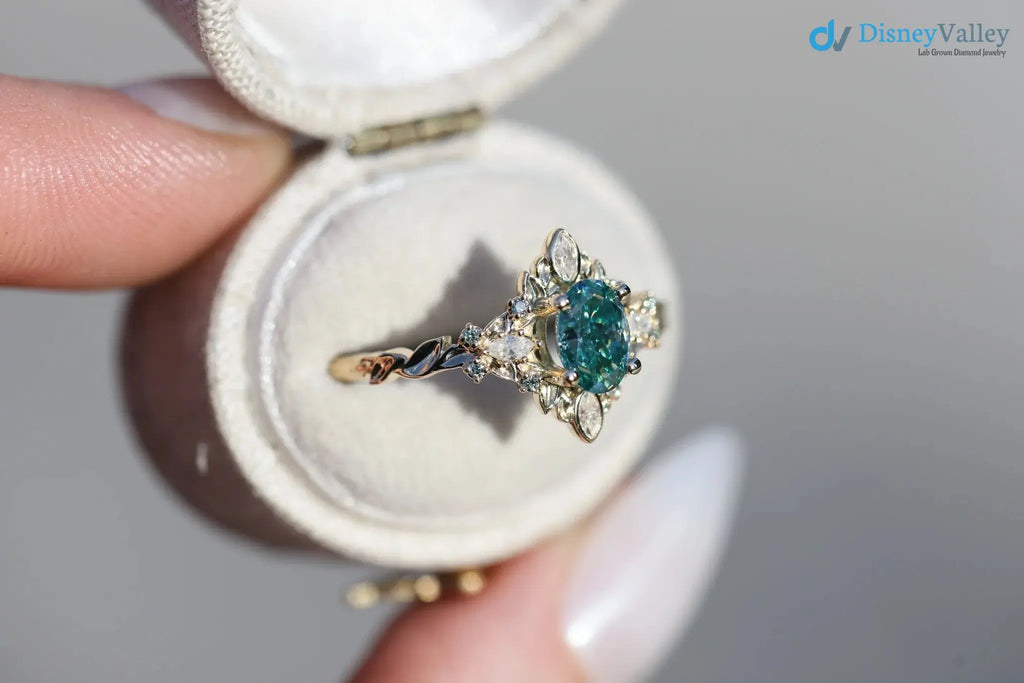 Galadriel with 7x5mm oval teal marquise cut lab grown engagement ring DisneyValley