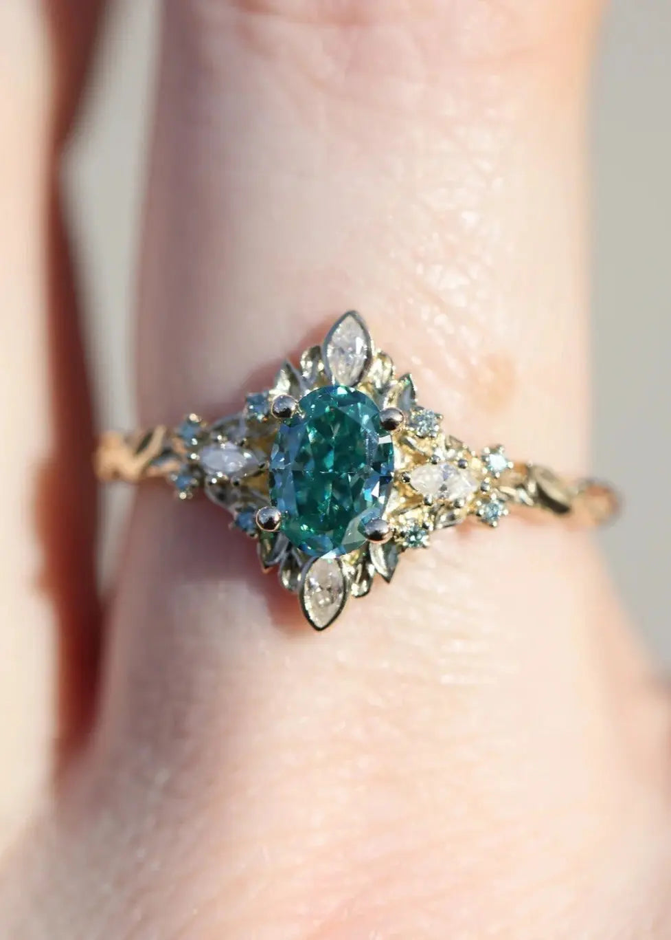 Galadriel with 7x5mm oval teal marquise cut lab grown engagement ring DisneyValley