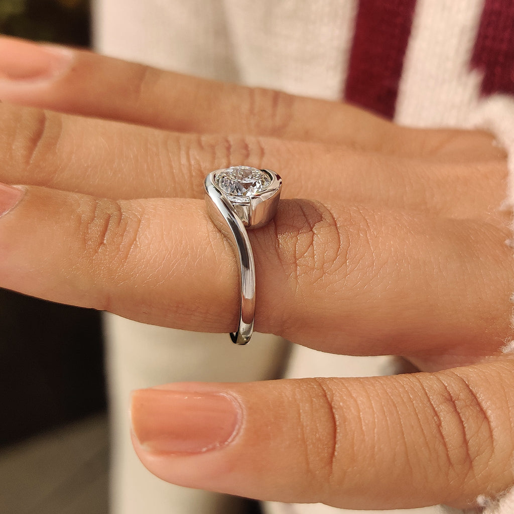 Solitaire Portuguese Cut Diamond Ring in Half Bezel