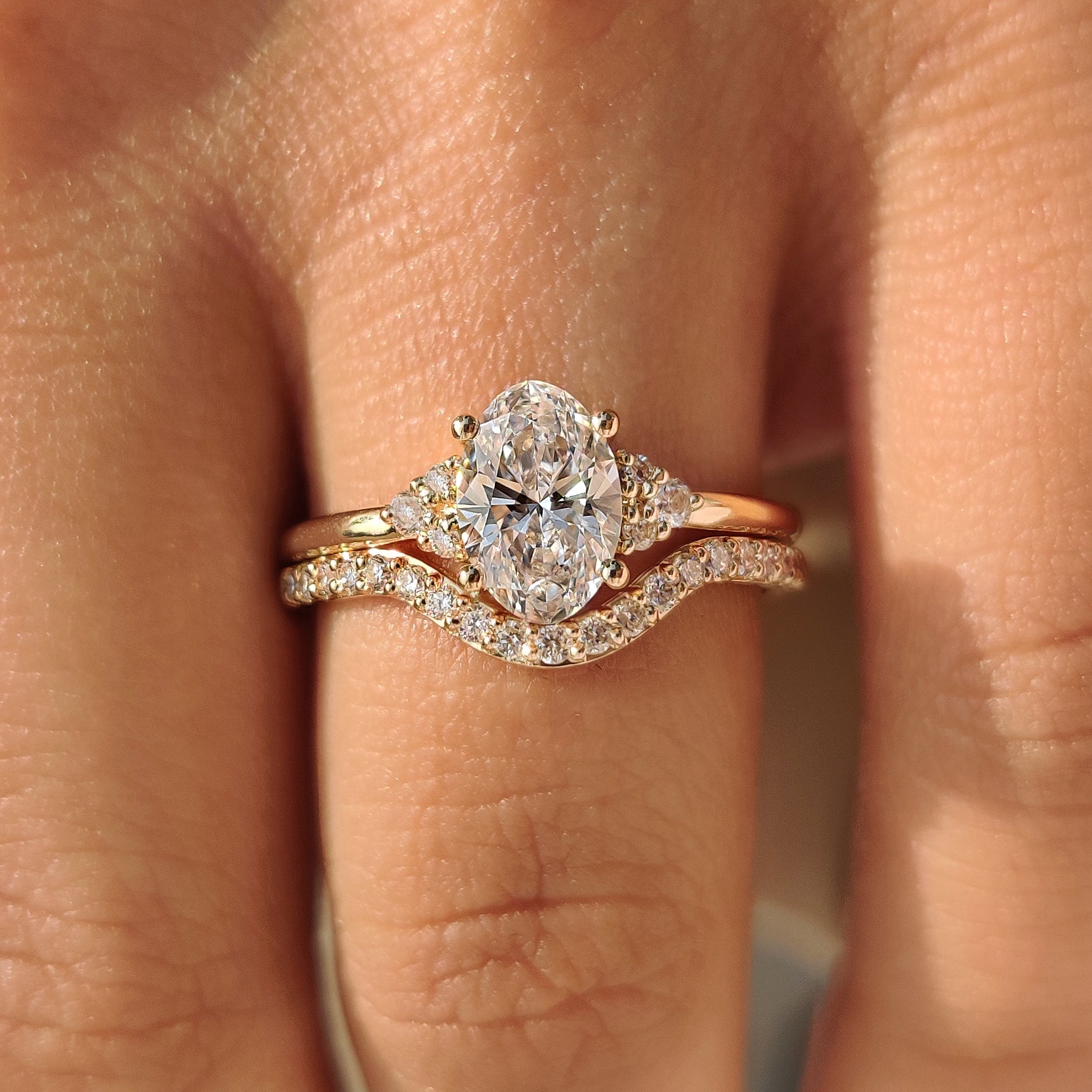 Oval Engagement Ring with Wedding Band in Half Eternity Style