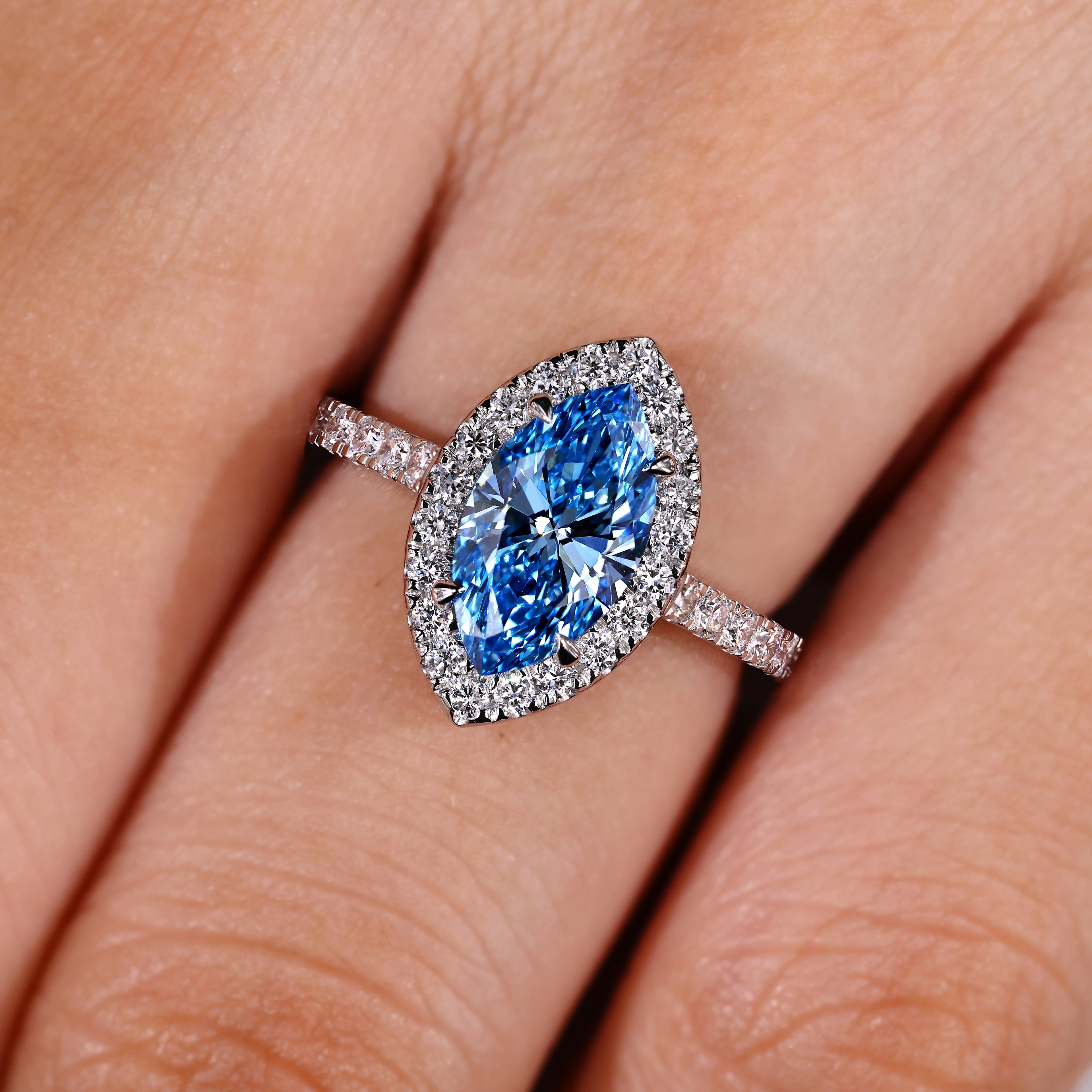 Blue Marquise Cut Diamond Ring in Halo Style