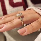 Oval Cut Diamond Ring in Round Cut Diamond Basket Setting