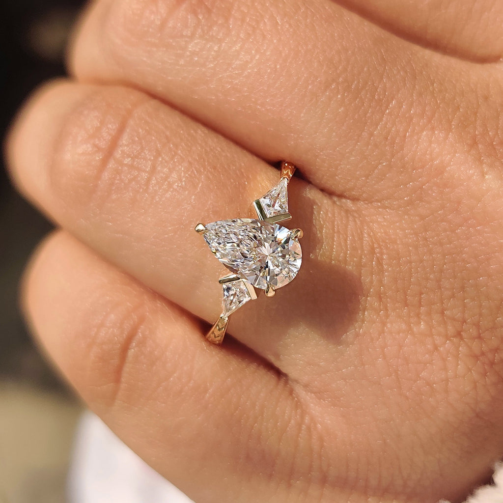 Pear and Kite Cut Three Diamond Ring with Art Deco Band