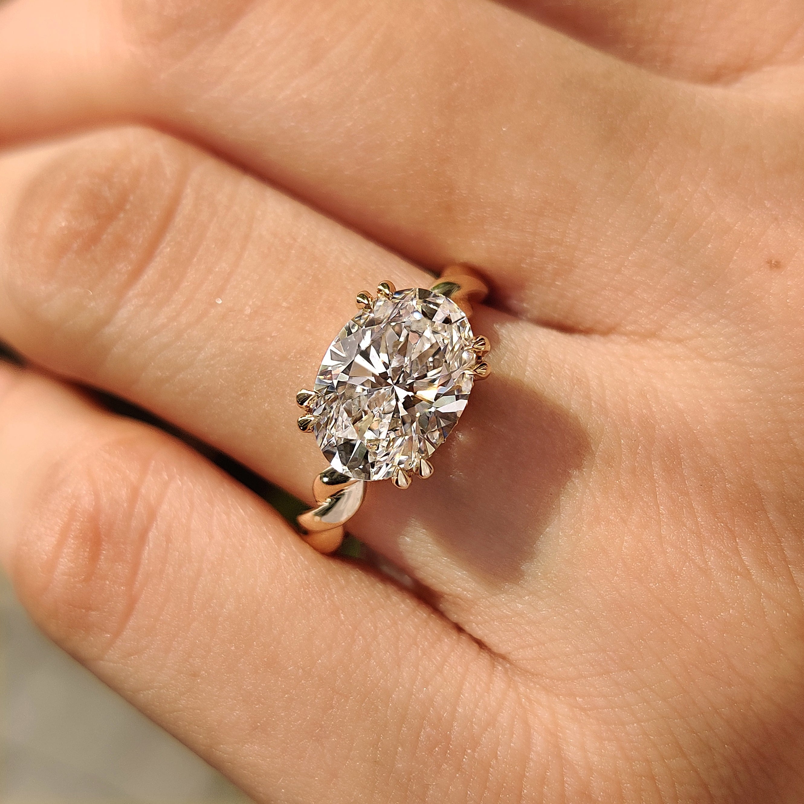 Solitaire Oval Cut Engagement Ring In East To West Setting