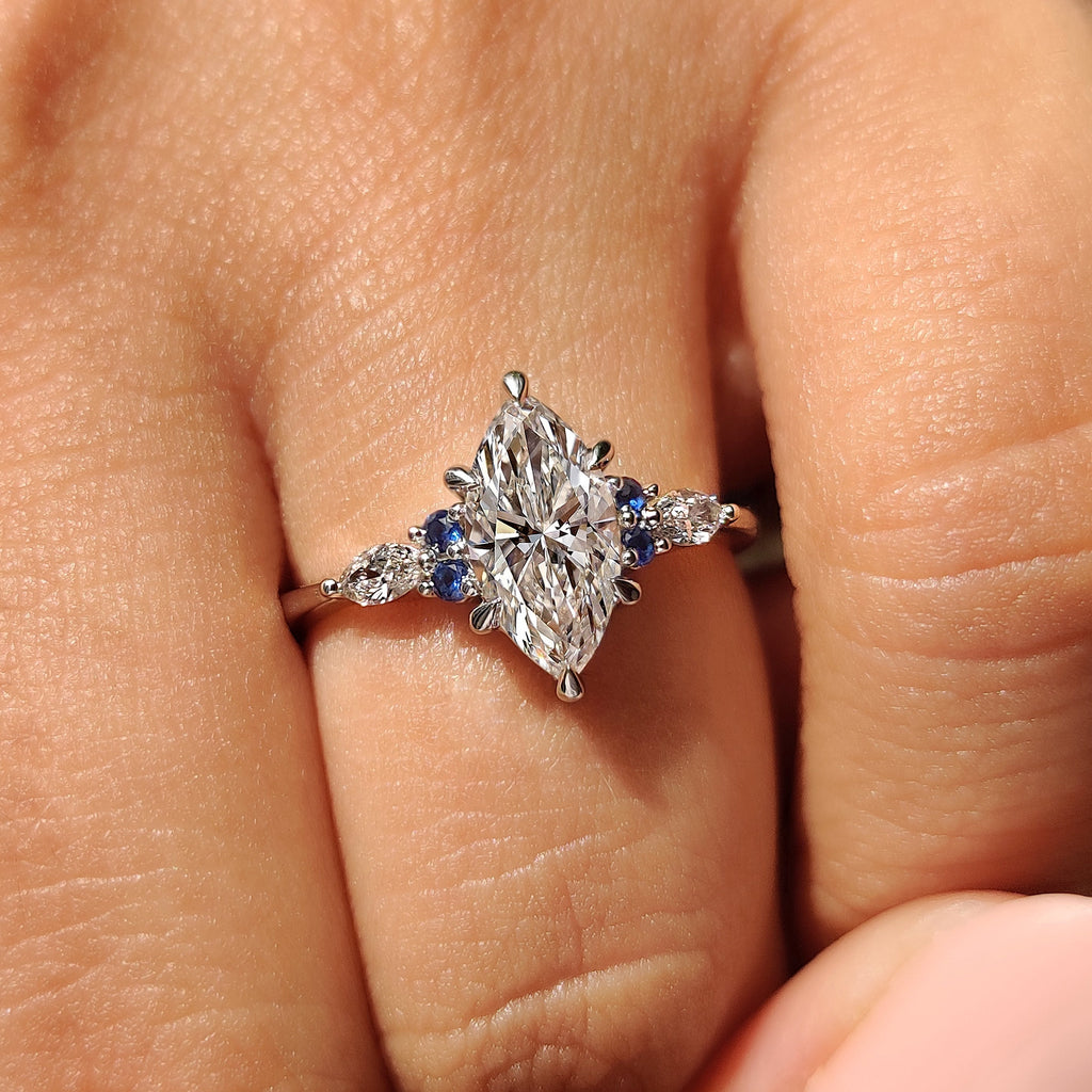 Marquise Cut Engagement Ring With Blue Sapphire Side Stone Style