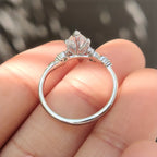 Marquise Cut Diamond Ring in Side Stone Style