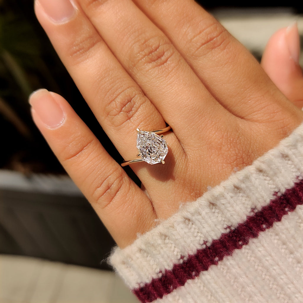 Pear Step Cut Diamond Solitaire Engagement Ring in Bypass Setting
