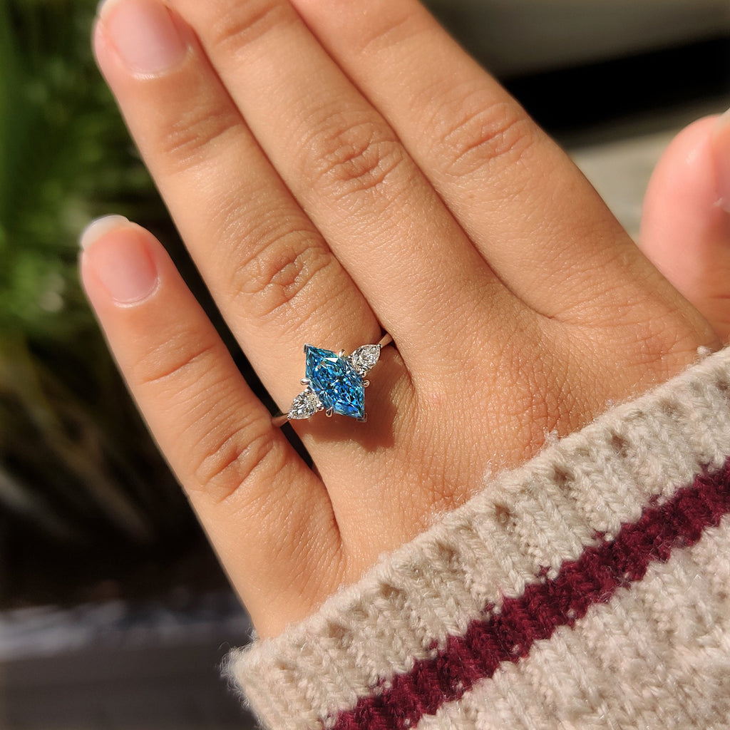 Blue Dutch Marquise Three Stone Ring with Pear Side Stones