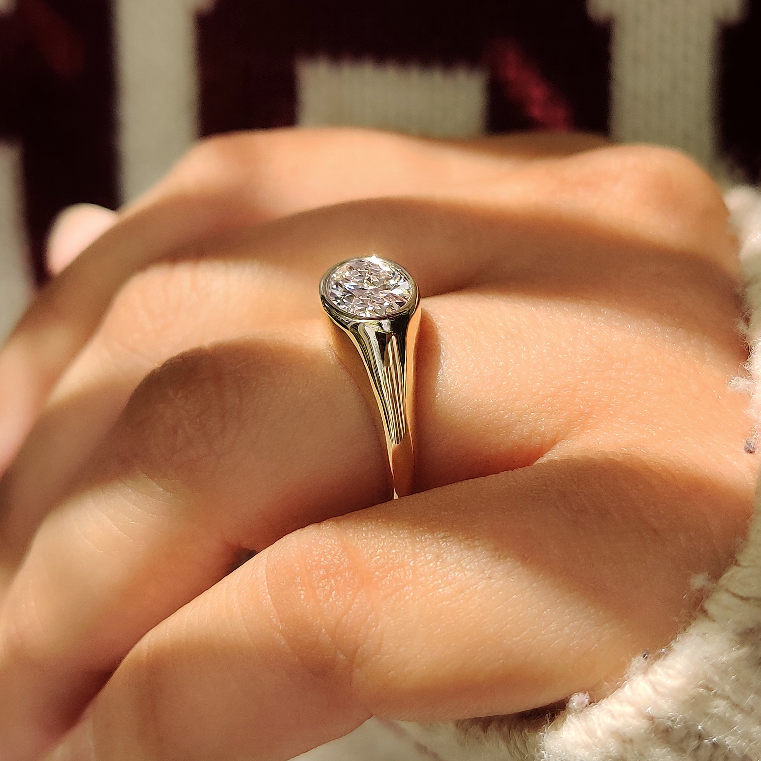Solitaire Oval Diamond Ring in Bezel Setting