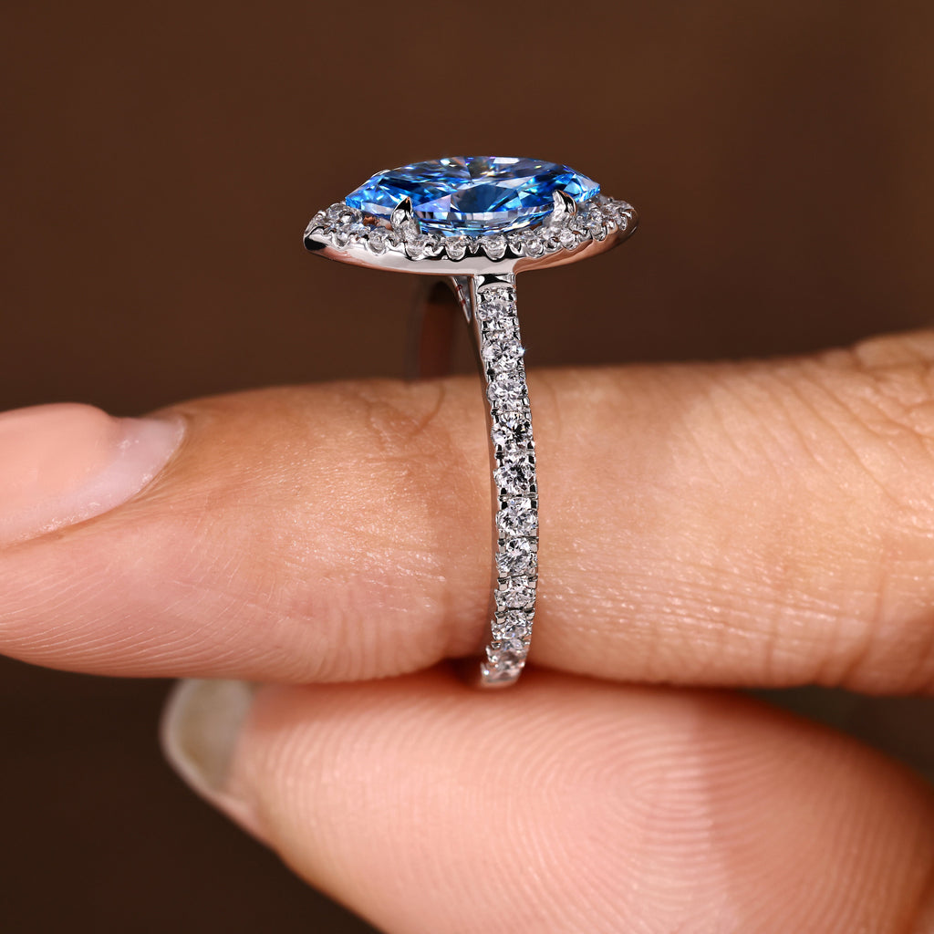 Blue Marquise Cut Diamond Ring in Halo Style