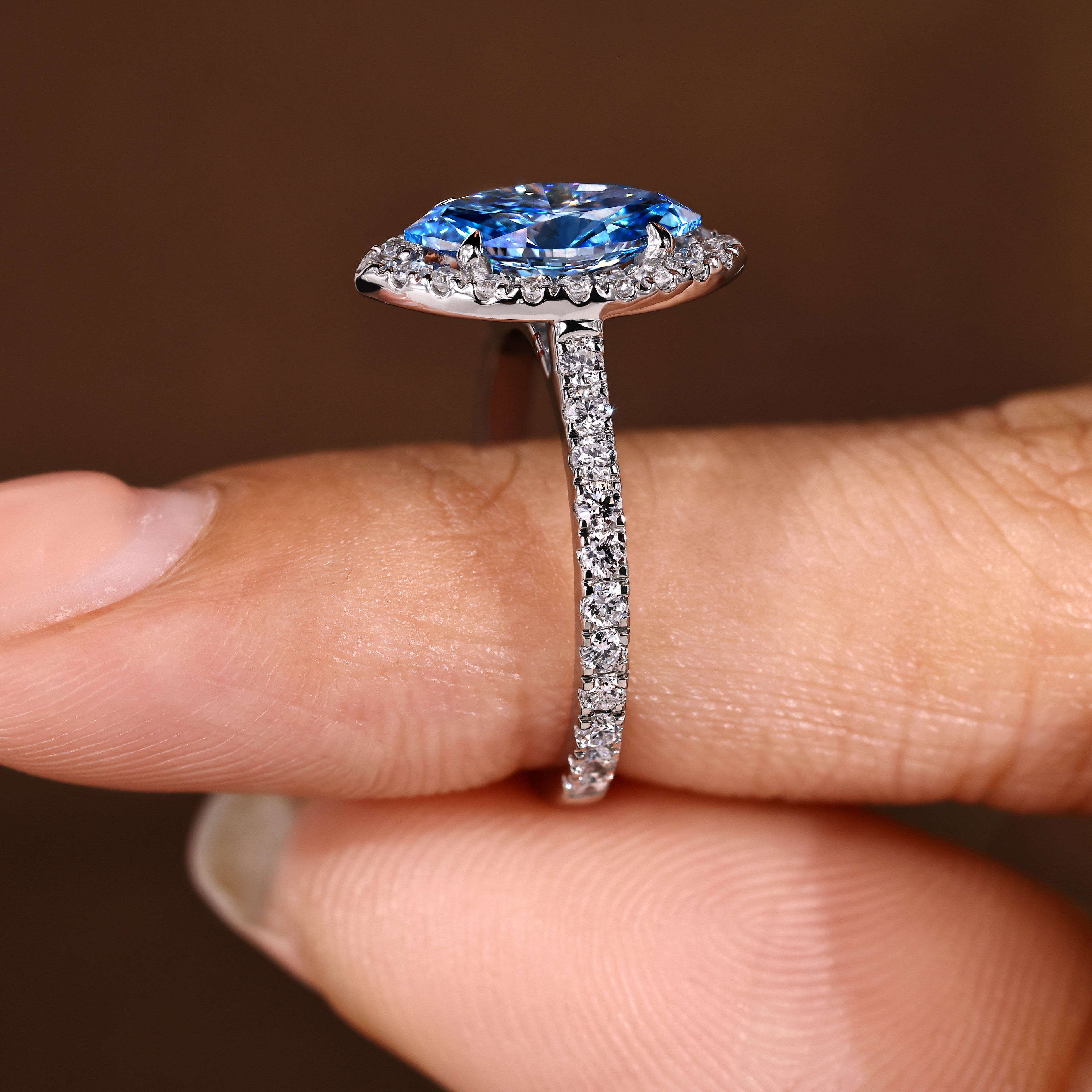 Blue Marquise Cut Diamond Ring in Halo Style