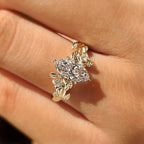 Nature Inspired Marquise Cut Engagement Ring with Round Side Stone
