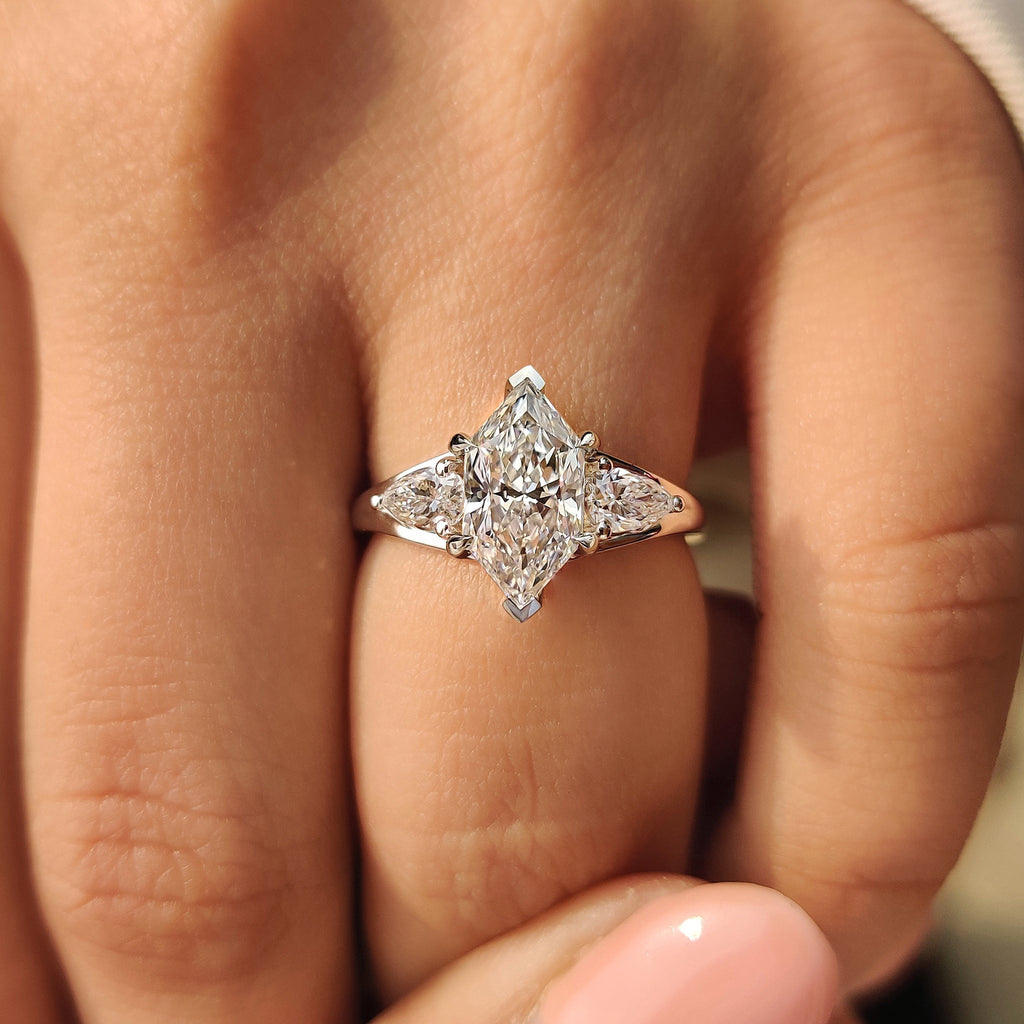 Three Stone Style Dutch Marquise Diamond Ring With Pear Side Stone