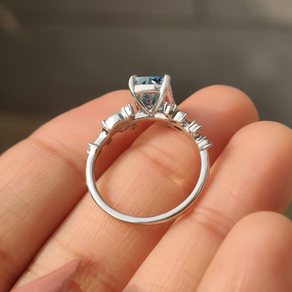 Blue Cushion Cut Diamond Ring in Cluster Setting