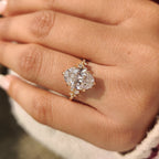 Oval Diamond Ring With Round Side Stones