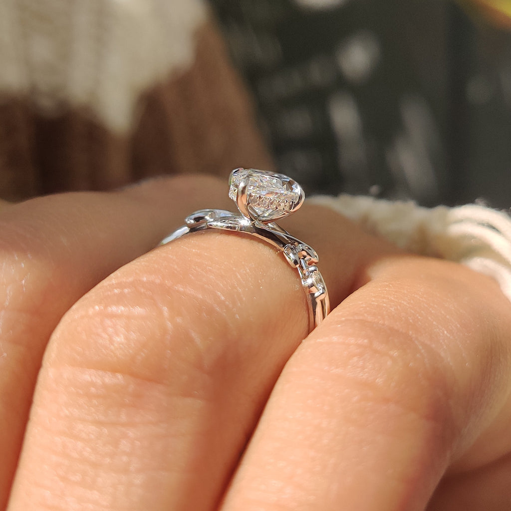 Marquise Cut Ring with Round Side Stone in Nature Inspired Style