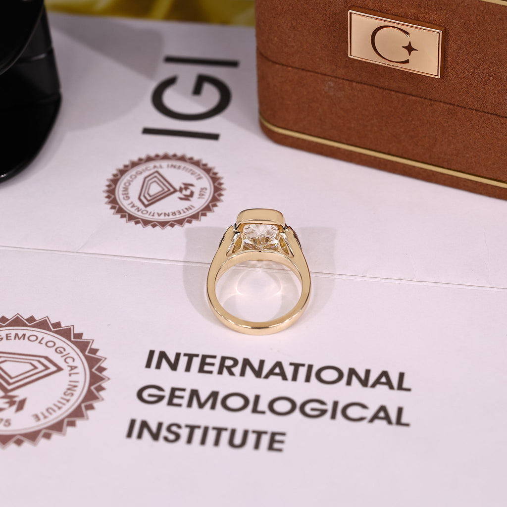 IGI Certified 5-10 Carat Elongated Cushion Cut Ring in bezel setting